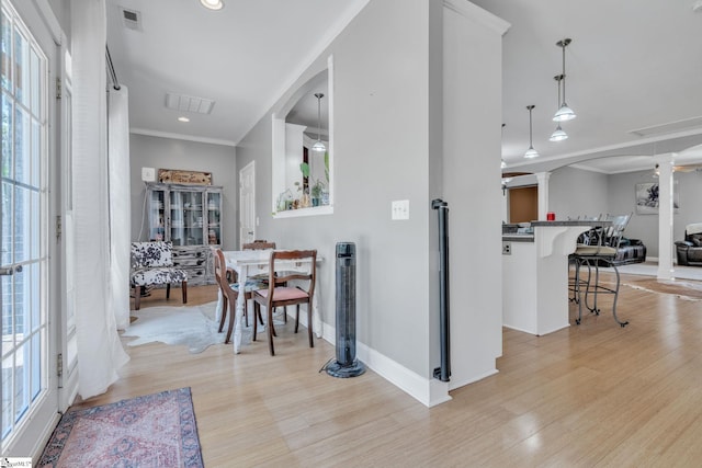 317 Hunter Rd, Fountain Inn, SC 29644 - foyer entrance with ornate columns, healthy amount of natural light, arched walkways, crown molding, and recessed lighting