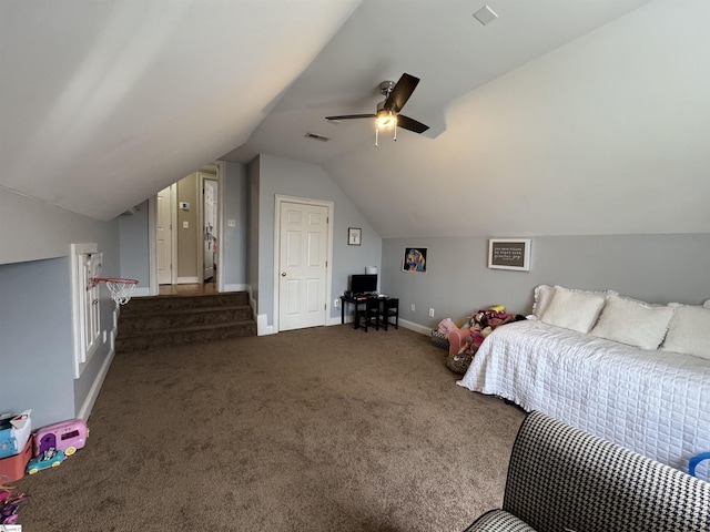 carpeted bedroom with vaulted ceiling, ceiling fan, and baseboards