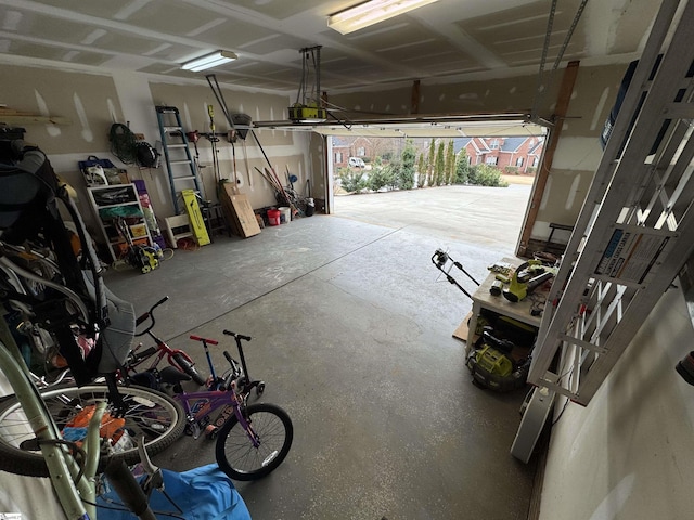 garage featuring a garage door opener
