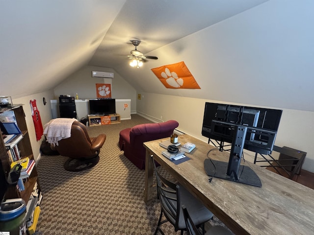 interior space featuring vaulted ceiling, a ceiling fan, a desk, and a wall mounted AC