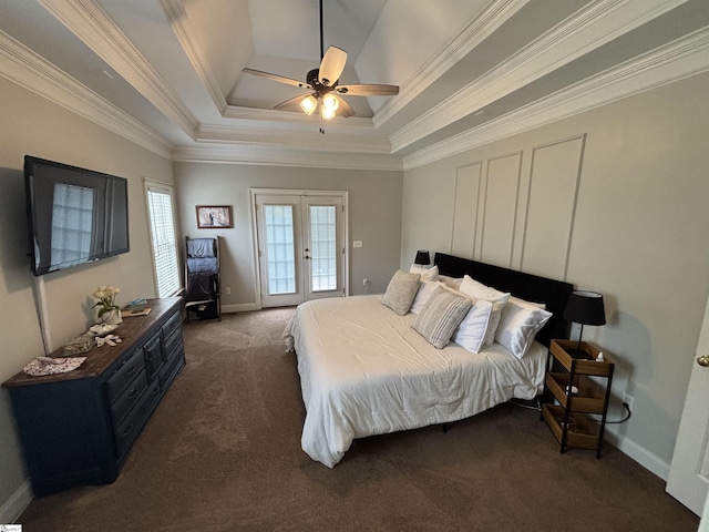 bedroom featuring a raised ceiling, access to outside, dark colored carpet, ornamental molding, and baseboards