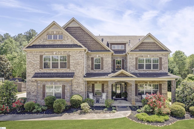 9 Bellagio Way, Greer, SC 29650 - craftsman-style home featuring a porch and brick siding