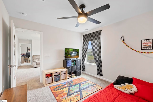 bedroom featuring carpet floors, baseboards, and ceiling fan