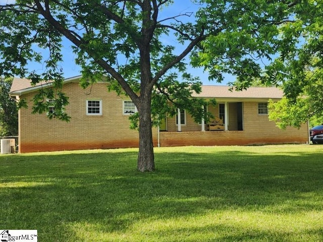 199 Ccc Camp Rd, Greer, SC 29651 - view of front of property featuring a front lawn, central AC unit, and brick siding