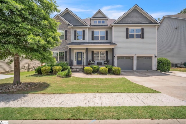 549 Allenton Way, Greer, SC 29651 - craftsman inspired home featuring a porch, concrete driveway, a front lawn, an attached garage, and central AC