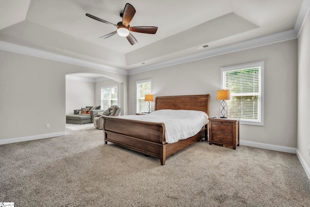 549 Allenton Way, Greer, SC 29651 - carpeted bedroom with a tray ceiling, ornamental molding, baseboards, arched walkways, and ceiling fan