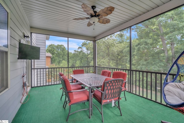 549 Allenton Way, Greer, SC 29651 - sunroom featuring ceiling fan, outdoor dining area, and view of scattered trees