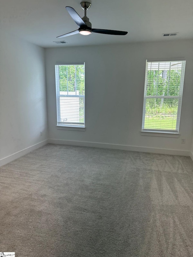 234 Woodhouse Way # 1, Greenville, SC 29605 - spare room with baseboards, ceiling fan, and carpet