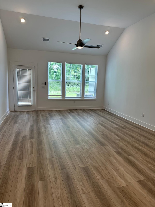 234 Woodhouse Way # 1, Greenville, SC 29605 - unfurnished living room featuring a ceiling fan, lofted ceiling, wood finished floors, baseboards, and recessed lighting