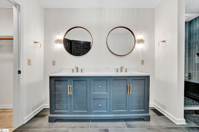 167 Lake Bowen Dr, Inman, SC 29349 - full bathroom with double vanity, baseboards, a shower, and tile patterned floors