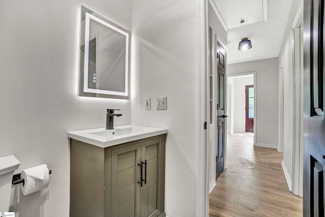 167 Lake Bowen Dr, Inman, SC 29349 - bathroom featuring wood finished floors, vanity, and baseboards