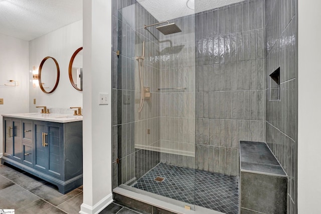 167 Lake Bowen Dr, Inman, SC 29349 - full bathroom featuring walk in shower, a textured ceiling, double vanity, and baseboards