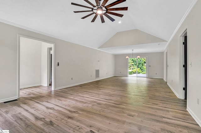167 Lake Bowen Dr, Inman, SC 29349 - unfurnished living room featuring ceiling fan, vaulted ceiling, wood finished floors, a chandelier, and baseboards