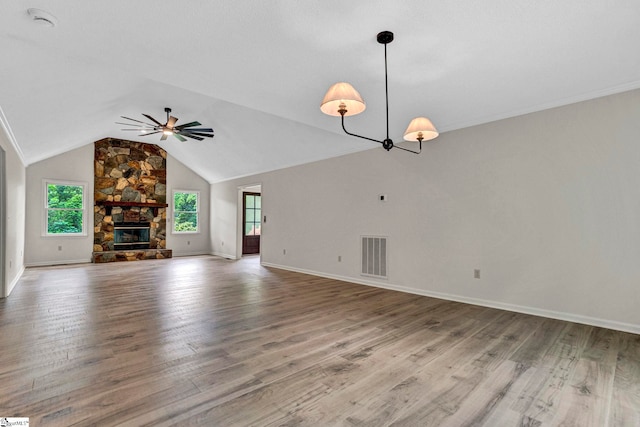 167 Lake Bowen Dr, Inman, SC 29349 - unfurnished living room featuring a ceiling fan, wood finished floors, vaulted ceiling, baseboards, and a fireplace