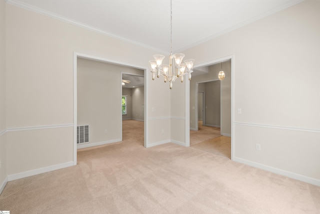 unfurnished dining area featuring carpet, crown molding, a chandelier, and baseboards