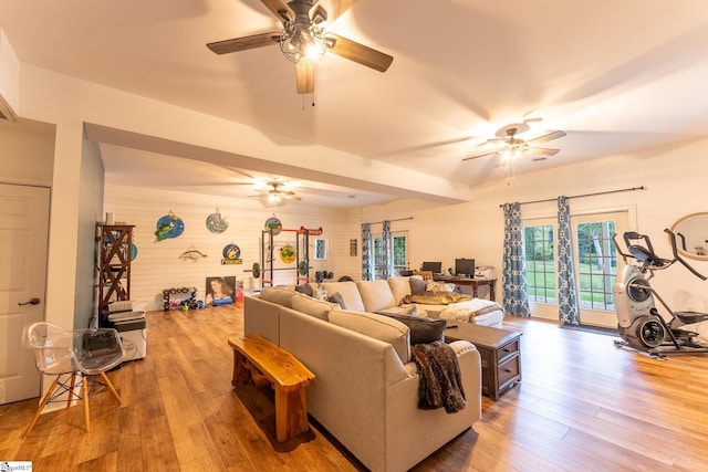 122 Fair Heaven Ct, Seneca, SC 29672 - living room with a ceiling fan, hardwood / wood-style flooring, and wood walls