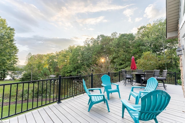 122 Fair Heaven Ct, Seneca, SC 29672 - wooden terrace with outdoor dining area and view of wooded area