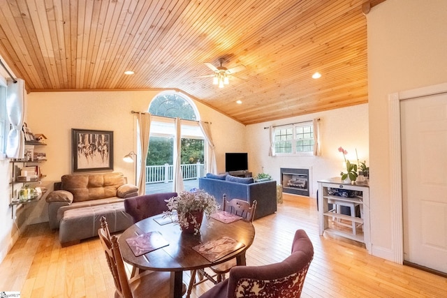 122 Fair Heaven Ct, Seneca, SC 29672 - dining room featuring wood ceiling, healthy amount of natural light, vaulted ceiling, a fireplace, and light wood-style floors