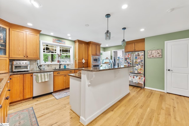 700 Old Green Pond Rd, Anderson, SC 29625 - kitchen featuring stainless steel appliances, a sink, a center island, light wood-type flooring, and recessed lighting