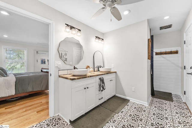 700 Old Green Pond Rd, Anderson, SC 29625 - ensuite bathroom featuring a ceiling fan, recessed lighting, double vanity, baseboards, and crown molding
