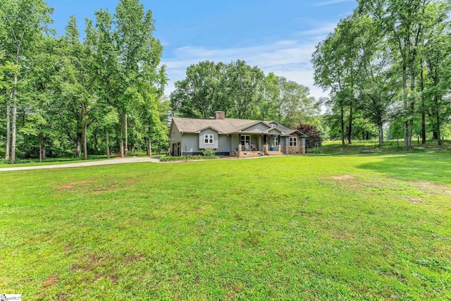 700 Old Green Pond Rd, Anderson, SC 29625 - view of front of property featuring concrete driveway, a chimney, a front lawn, and view of wooded area