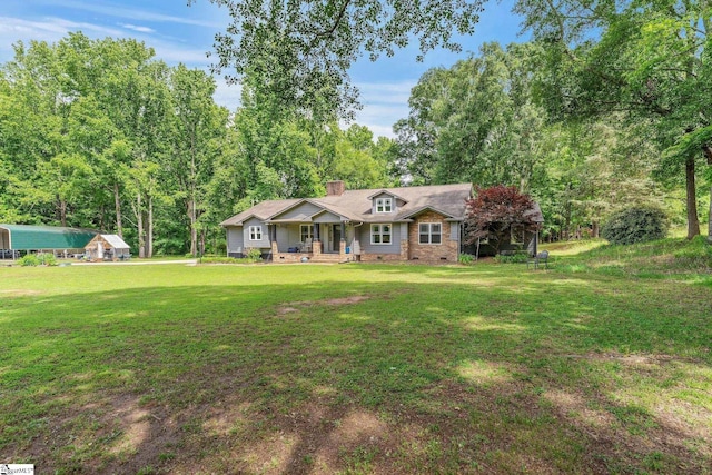 700 Old Green Pond Rd, Anderson, SC 29625 - view of front of house featuring a front lawn, a chimney, crawl space, and covered porch