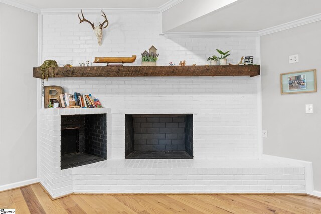 700 Old Green Pond Rd, Anderson, SC 29625 - detailed view of wood finished floors, crown molding, a brick fireplace, and baseboards
