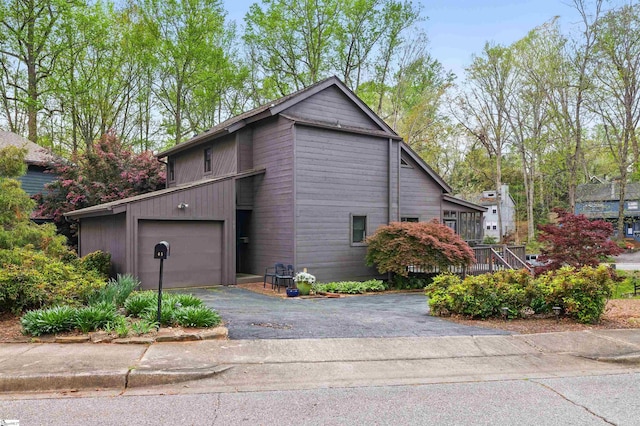 65 Westview Ave, Greenville, SC 29607 - view of side of home with driveway and a garage