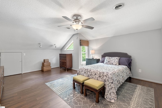 65 Westview Ave, Greenville, SC 29607 - bedroom featuring a textured ceiling, wood finished floors, baseboards, lofted ceiling, and ceiling fan