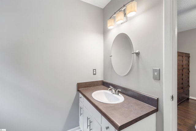 65 Westview Ave, Greenville, SC 29607 - bathroom featuring vanity, wood finished floors, and baseboards