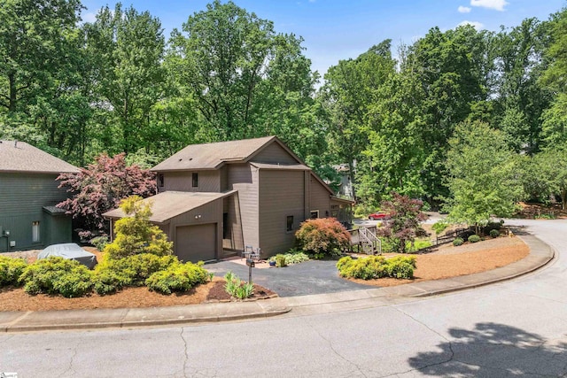 65 Westview Ave, Greenville, SC 29607 - mid-century home with asphalt driveway and an attached garage