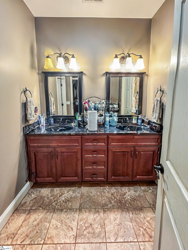 586 Silver Shoals Cir, Marietta, SC 29661 - full bathroom featuring double vanity and baseboards