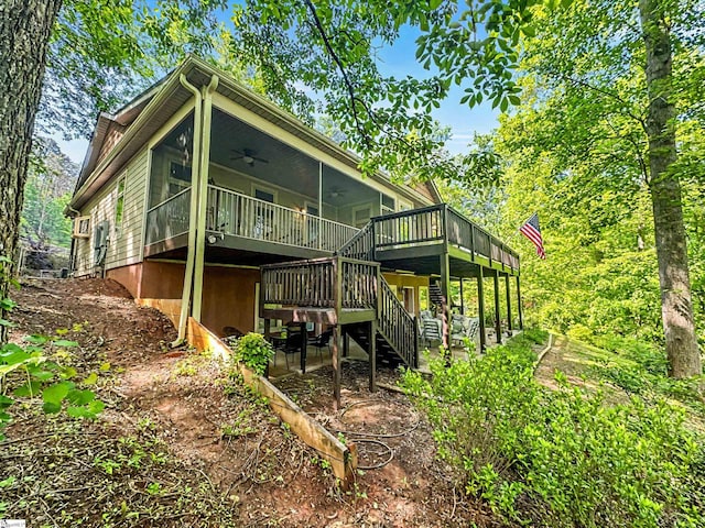 586 Silver Shoals Cir, Marietta, SC 29661 - back of house featuring ceiling fan, a deck, stairs, a patio area, and a sunroom