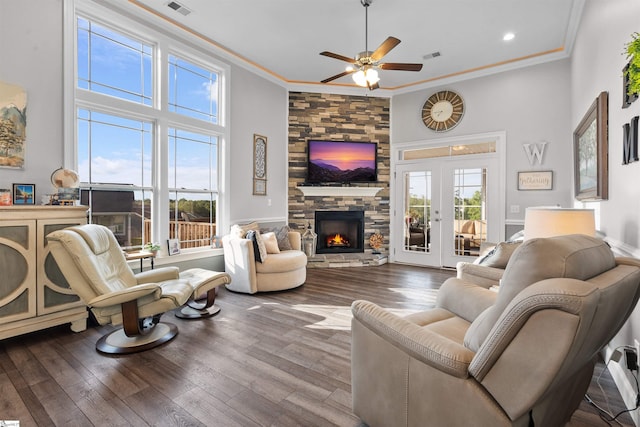 406 Jersey Queen Trl, Greer, SC 29651 - living room with ornamental molding, a ceiling fan, wood finished floors, a fireplace, and french doors