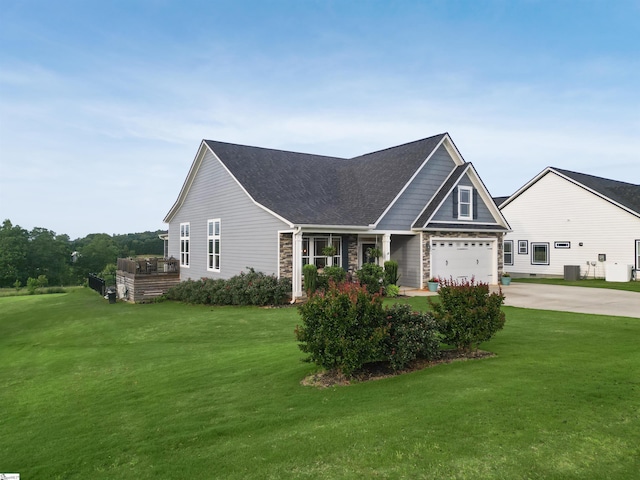 406 Jersey Queen Trl, Greer, SC 29651 - craftsman inspired home featuring concrete driveway, a front lawn, a garage, roof with shingles, and stone siding