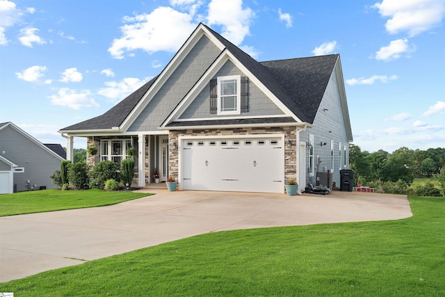 406 Jersey Queen Trl, Greer, SC 29651 - craftsman house with driveway, a front yard, and stone siding