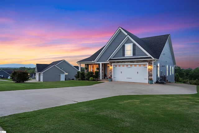 406 Jersey Queen Trl, Greer, SC 29651 - view of front of home with concrete driveway, a front yard, stone siding, and a garage