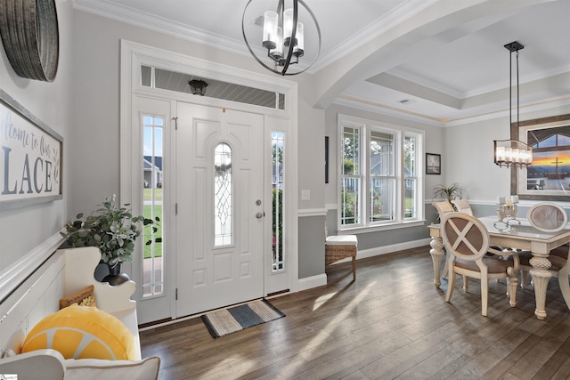 406 Jersey Queen Trl, Greer, SC 29651 - entrance foyer with a chandelier, arched walkways, ornamental molding, wood-type flooring, and baseboards