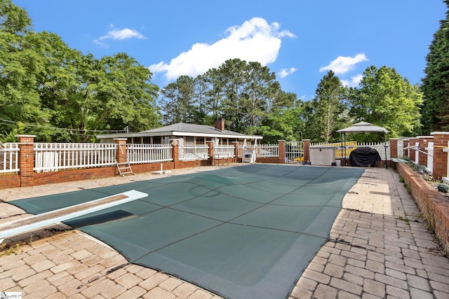 12 Fowler Cir, Greenville, SC 29607 - view of pool with a diving board, fence, and view of scattered trees