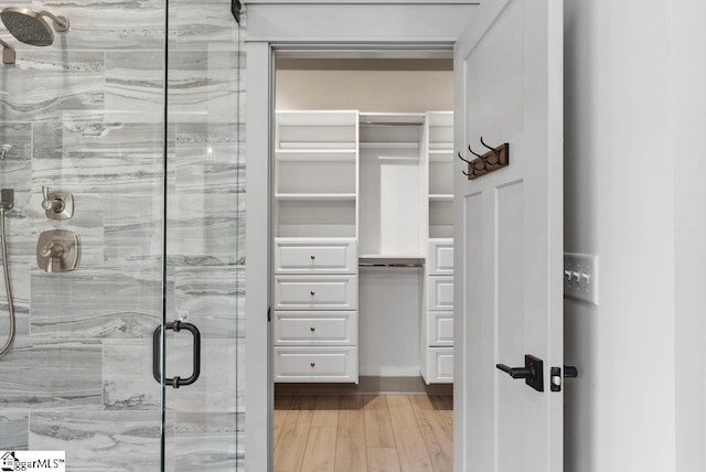 5 Maxfli Ct, Greenville, SC 29690 - full bathroom featuring a stall shower and wood finished floors