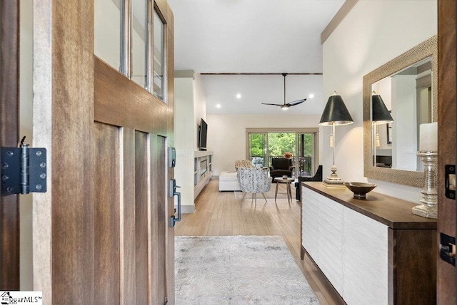 5 Maxfli Ct, Greenville, SC 29690 - kitchen with light wood-style flooring, glass insert cabinets, white cabinetry, recessed lighting, and ceiling fan