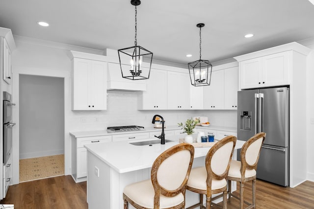 710 N Main St, Greer, SC 29651 - kitchen featuring appliances with stainless steel finishes, a sink, light countertops, recessed lighting, and pendant lighting