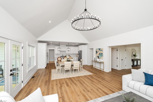 710 N Main St, Greer, SC 29651 - dining room featuring high vaulted ceiling, light wood-style flooring, a chandelier, and recessed lighting