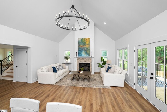 710 N Main St, Greer, SC 29651 - living area featuring high vaulted ceiling, a fireplace, french doors, stairs, and baseboards