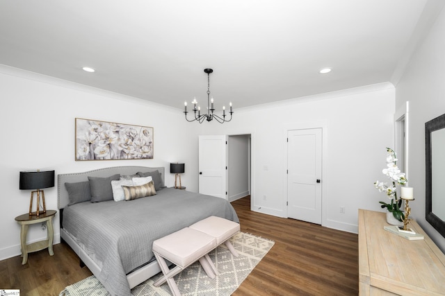 710 N Main St, Greer, SC 29651 - bedroom with a chandelier, wood finished floors, crown molding, baseboards, and recessed lighting