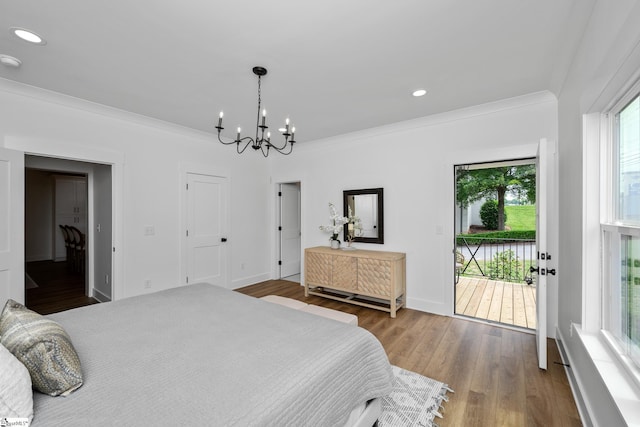 710 N Main St, Greer, SC 29651 - bedroom featuring a chandelier, access to outside, ornamental molding, wood finished floors, and recessed lighting