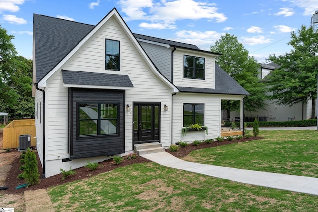 710 N Main St, Greer, SC 29651 - modern farmhouse style home with a shingled roof and central air condition unit