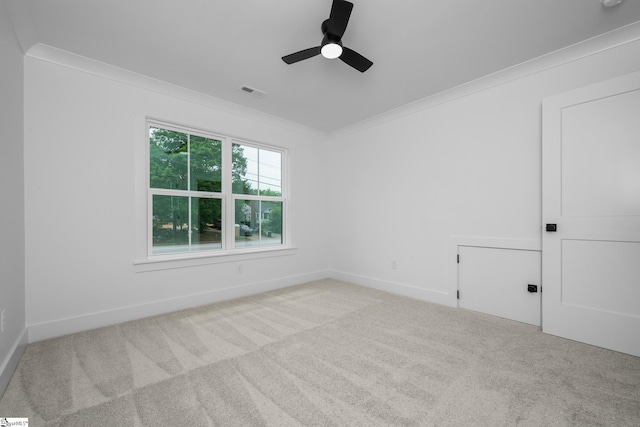 710 N Main St, Greer, SC 29651 - spare room with carpet floors, crown molding, a ceiling fan, and baseboards