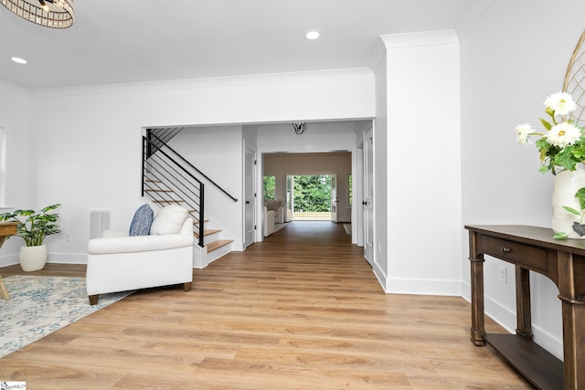 710 N Main St, Greer, SC 29651 - foyer entrance with stairway, light wood-style floors, recessed lighting, baseboards, and crown molding