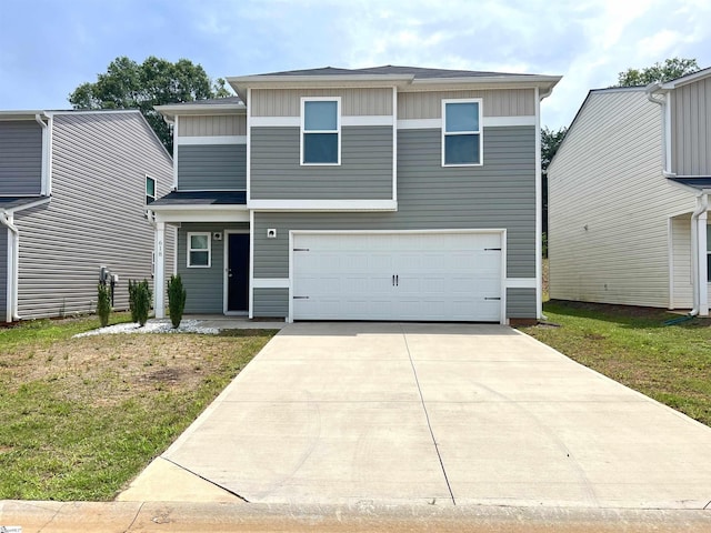 618 Farmstead Trl, Inman, SC 29349 - view of front of house featuring board and batten siding, an attached garage, concrete driveway, and a front yard